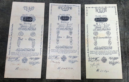 Obverse layout of the 1796 Austria issue Gulden Banco-Zettel banknotes. Features historic Franz II era monochrome copperplate typography, ornate imperial crests, and distinct early central bank validation stamps.