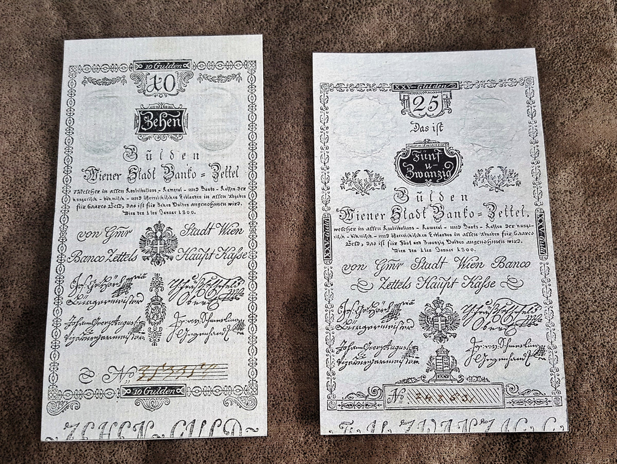 Obverse layout of the 1800 Austria issue Gulden Banco-Zettel banknotes. Features historic Franz II era monochrome copperplate typography, ornate imperial crests, and distinct early central bank validation stamps.