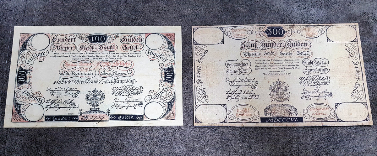 Obverse and reverse comparison of turn-of-the-century Austria 1806 treasury banknotes, demonstrating historical paper wear variations and distinct printing press ink penetration.