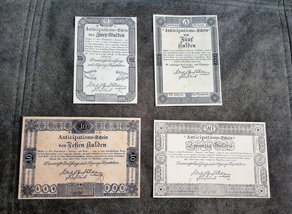 Obverse layout of the historical Austria 1813 series 2 Gulden and 5 Gulden emergency treasury notes. Features early nineteenth-century monochrome copperplate calligraphy, localized imperial signatures, and distinct central bank stamps.