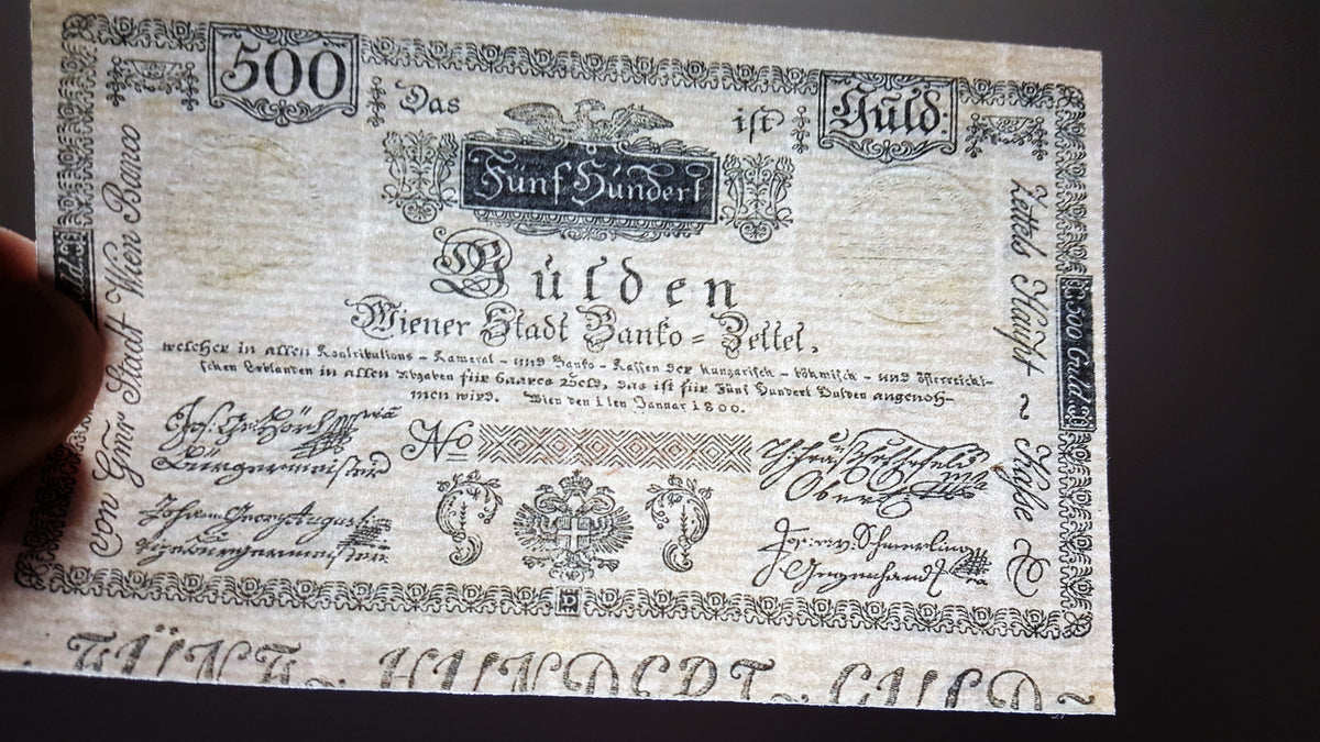 Detailed historical reference view of early Austrian 1800 Banco-Zettel currency varieties, showcasing clean printing plate registry lines and exceptional ink contrast for currency grading and research.