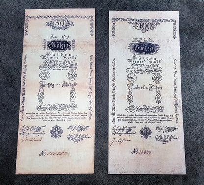 Obverse presentation of the 1796 series Austria Gulden treasury notes. Exhibits intricate early Austrian empire calligraphic scripts, traditional security border lathe work, and official financial signature blocks.