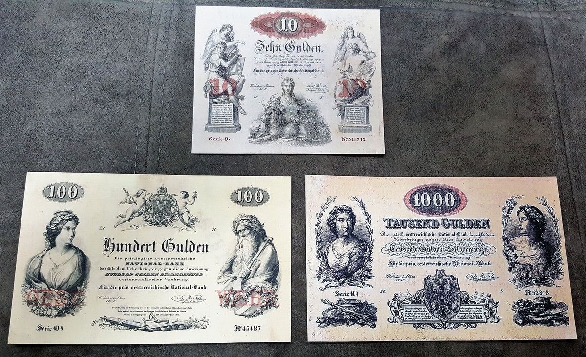  Obverse presentation of the 1854 and 1858 Austrian Imperial Treasury 10 Gulden legal tender bank notes. Displays highly detailed geometric security borders, official imperial crown symbols, and deep intaglio design contrast.