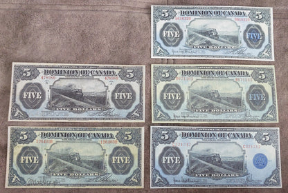 Dominion of Canada 5 Dollar 1912 Train Note Varieties with Blue and Red Serial Numbers