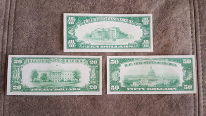 US 10, 20, and 50 Dollar 1928 Gold Certificates reverse greenback view showing Treasury and Capitol buildings