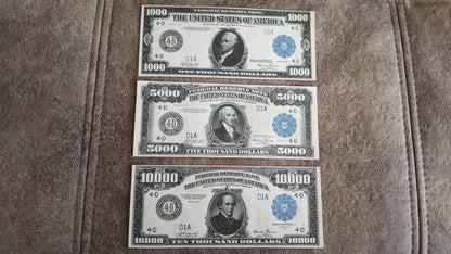 US high denomination 1000 Dollar Hamilton, 5000 Dollar Madison, and 10000 Dollar Chase 1918 Series blue seal Federal Reserve Notes front