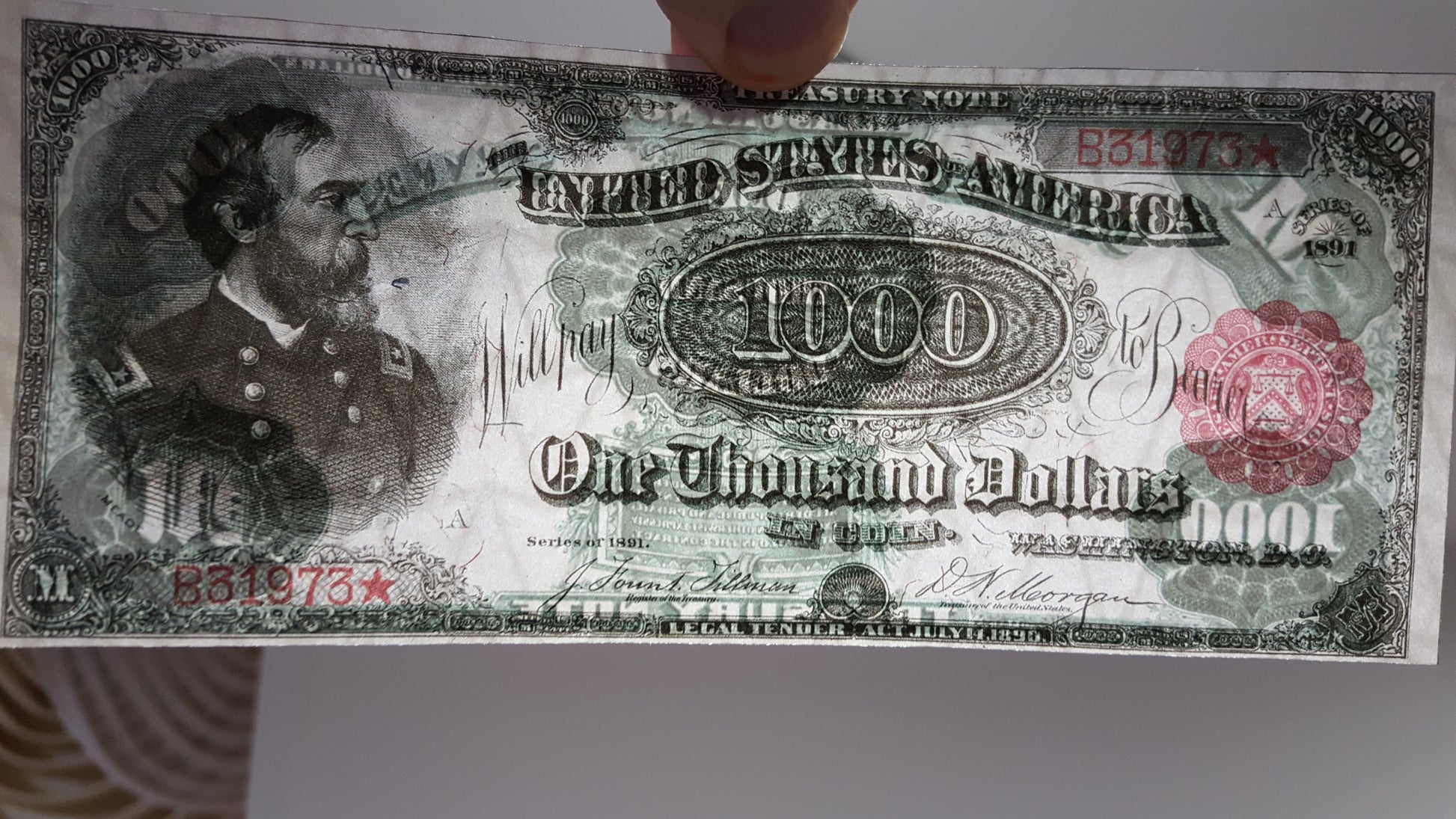 Detailed close-up view of US 1000 Dollar 1891 Treasury Note showing General Meade portrait and security paper texture