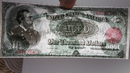 Detailed close-up view of US 1000 Dollar 1891 Treasury Note showing General Meade portrait and security paper texture