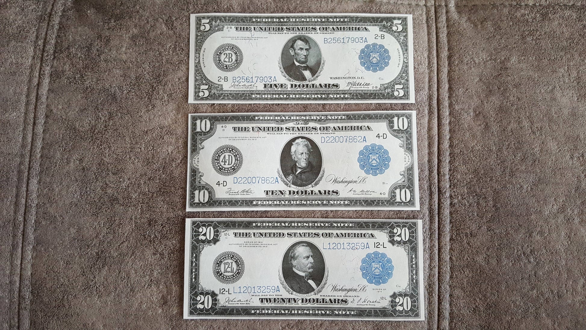US 5 Dollar Lincoln, 10 Dollar Hamilton, and 20 Dollar Cleveland 1914 Series blue seal Federal Reserve Notes front