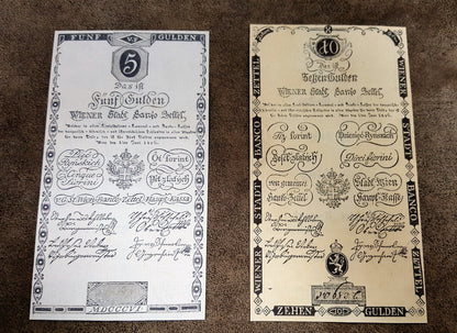  Obverse layout of the 1806 Austria issue Gulden Banco-Zettel banknotes. Features historic imperial era monochrome copperplate typography, ornate imperial crests, and distinct early central bank validation stamps.